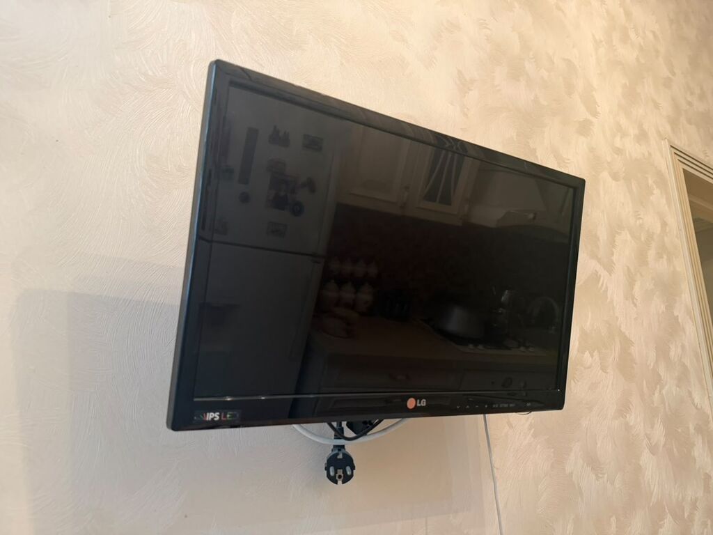 LG 22LK450 (22") LED TV – IPS panel, divara quraşdırma braketi ilə
