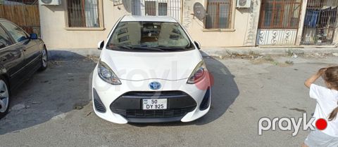 Toyota Aqua: 1.5 l | 2018 il Hetçbek