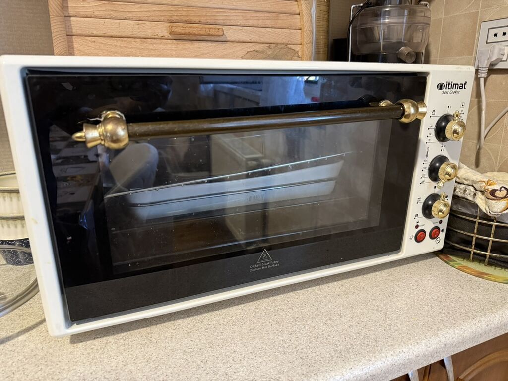 İtimat Best Cooker elektrikli soba. Ağ rəngli korpuslu, geniş ön