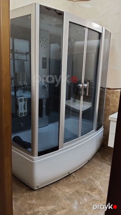 Hidromassajlı duş-kabina - Künc tipli oval baza, yüksək bortlu