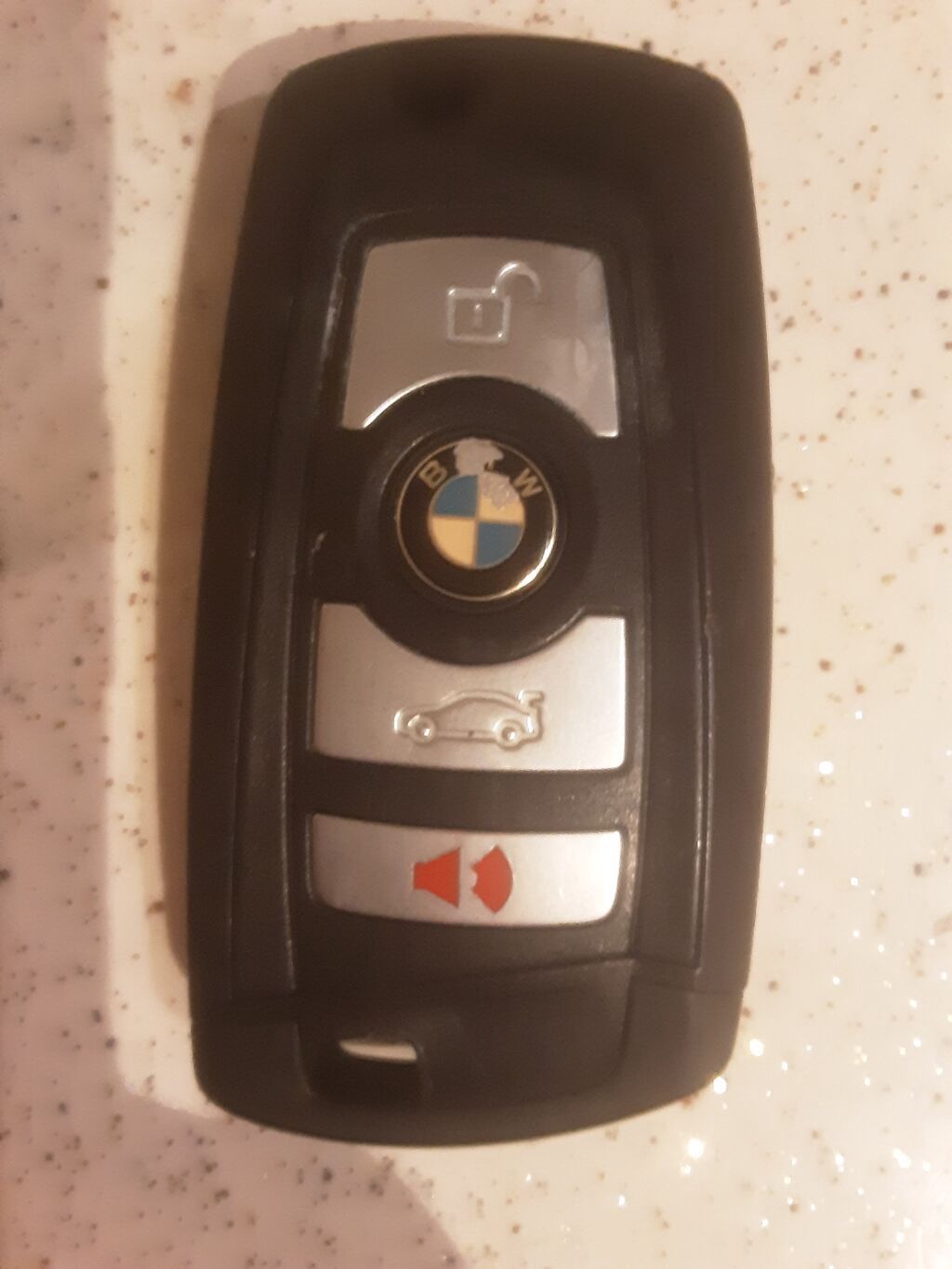 BMW avtomobil açarı (smart key/fob) - Üç düyməli idarəetmə: qapıların