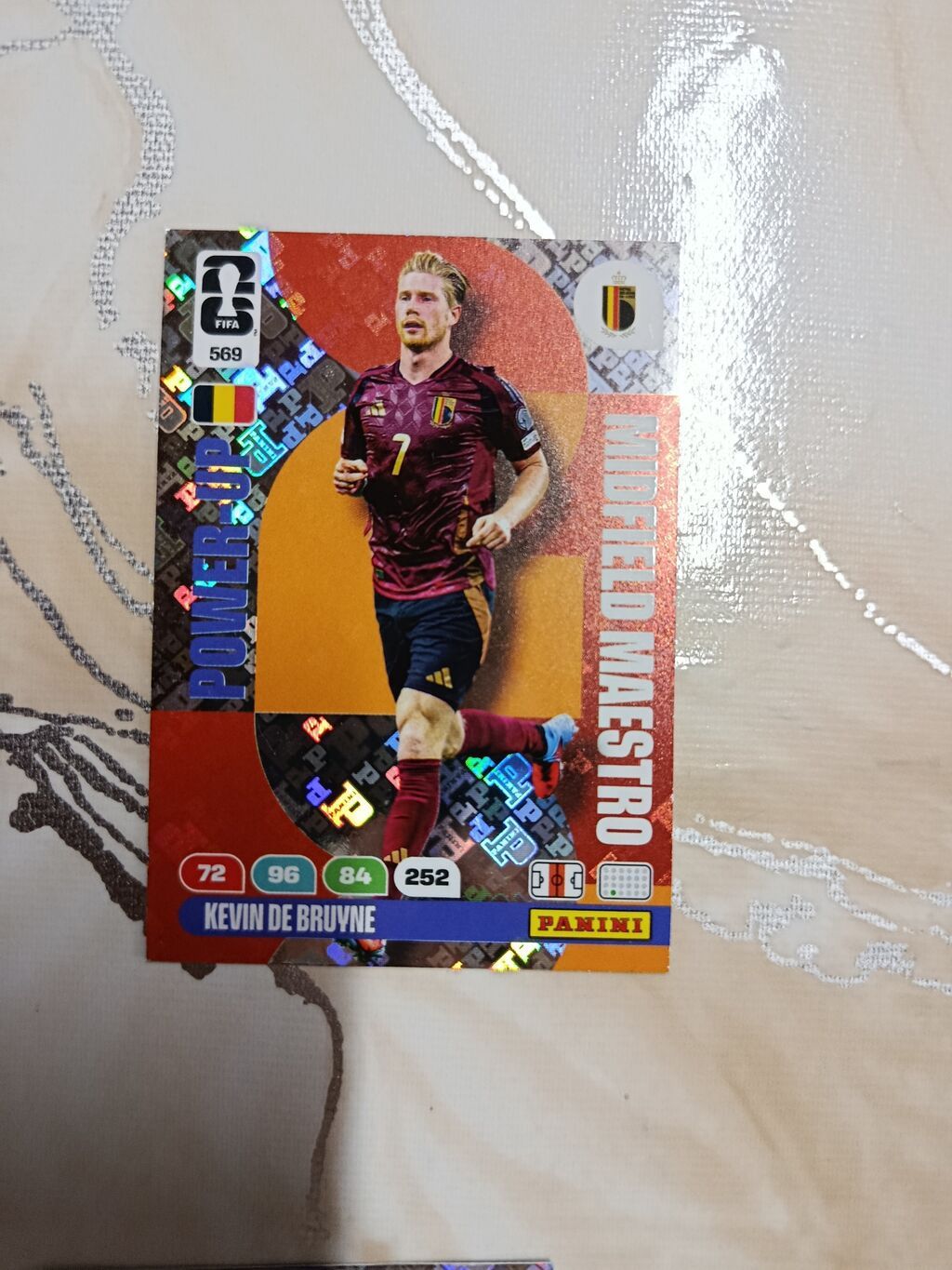 Panini futbol kolleksiya kartı – “Power Up | Midfield Maestro”