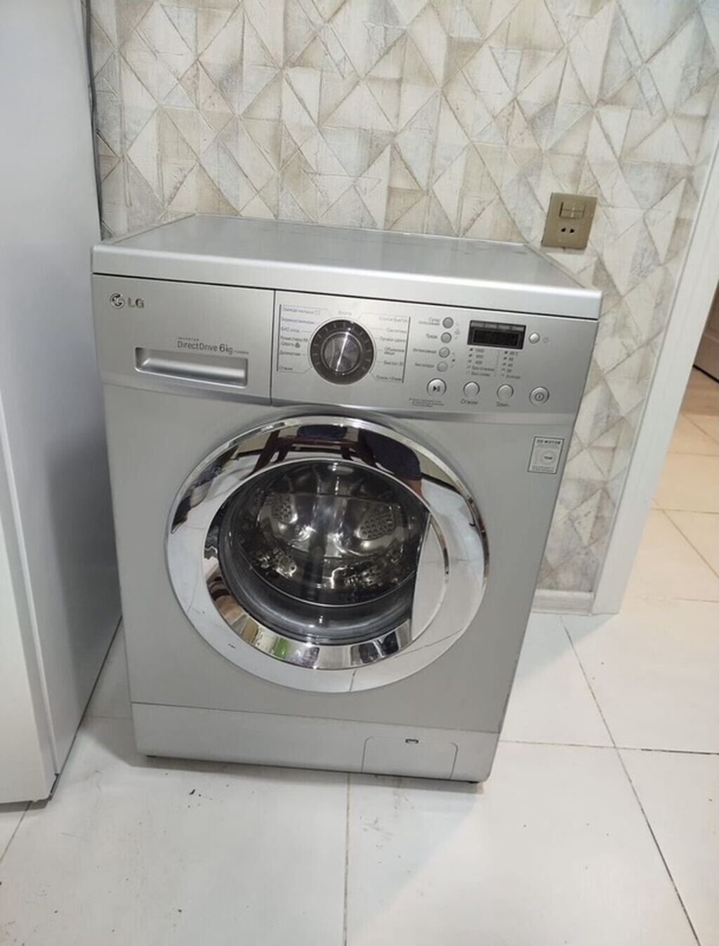 LG paltaryuyan maşın – ön yükləməli, gümüşü korpus. Xüsusiyyətlər: -