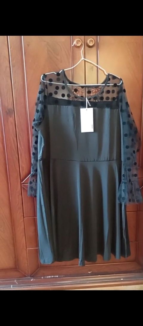 Qara rəngli zərif don - Model: A-kəsim, dizdən aşağı uzunluq - Parça