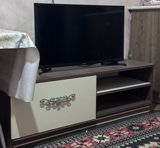 TV stendi: - Material: ağac teksturalı laminat - Rəng: tünd qəhvəyi — satici