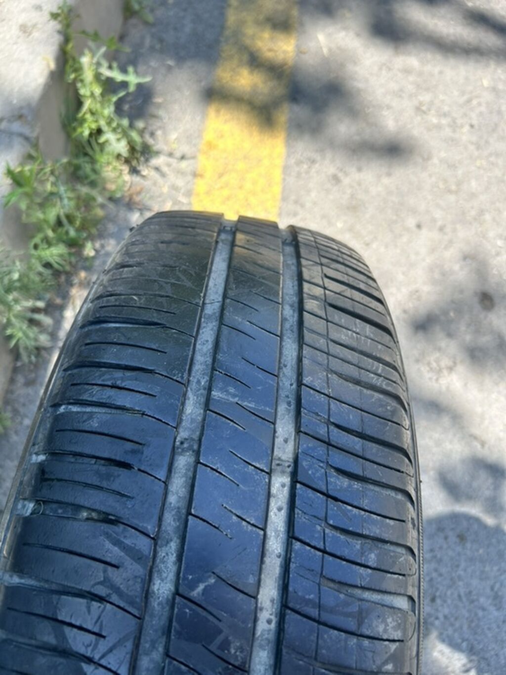 Michelin markalı avtomobil şini. Ölçüsü: **185/70 R14** Yük/sürət