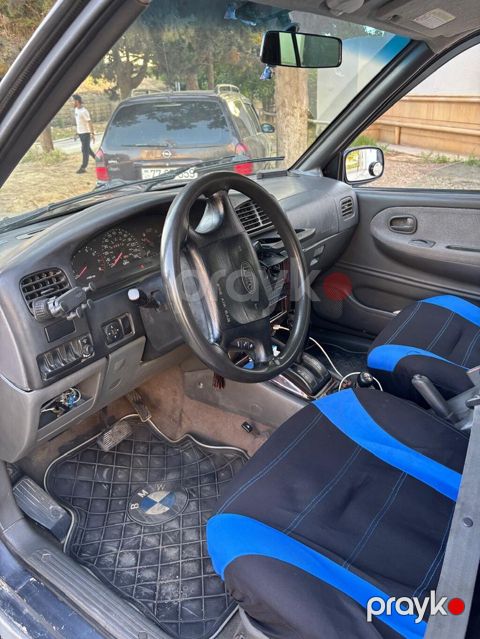 Kia Sportage: 2 l | 1999 il Ofrouder/SUV