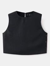 Qara rəngli, qolsuz qısa top. Minimalist dizayn, düz dairəvi yaxa və — Leman
