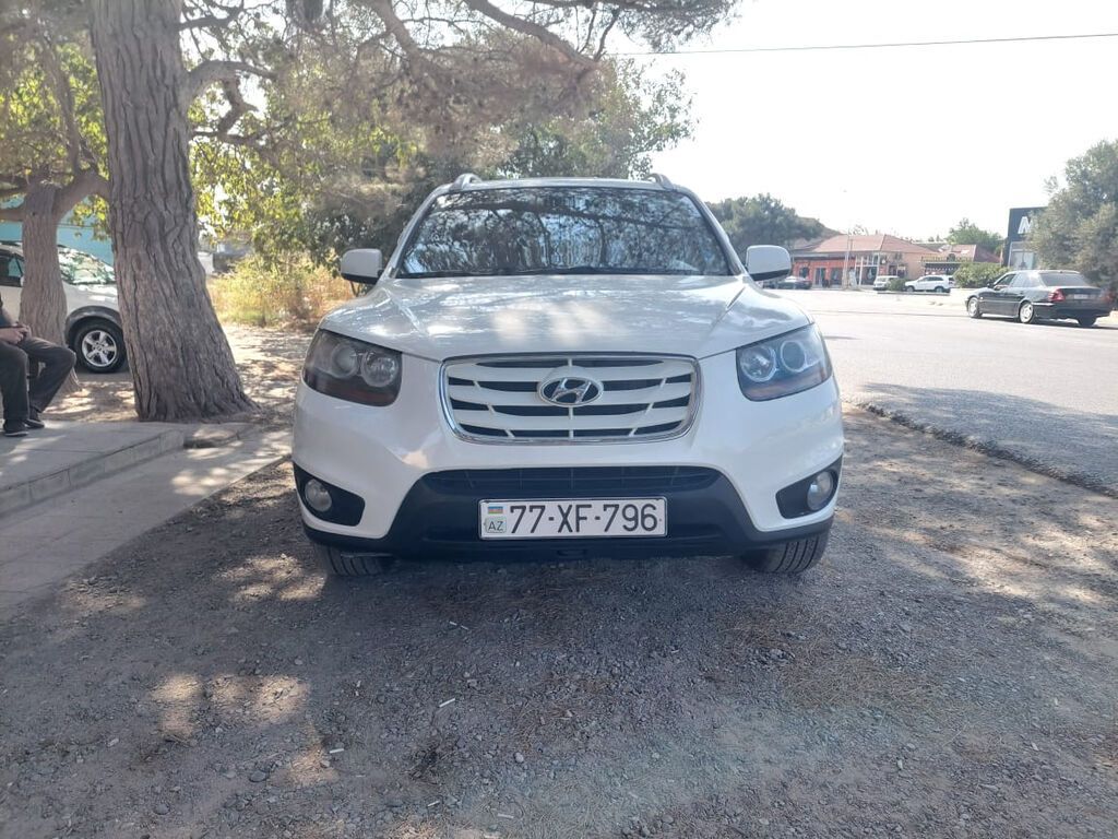 Hyundai Santa Fe: 2 l | 2011 il Universal