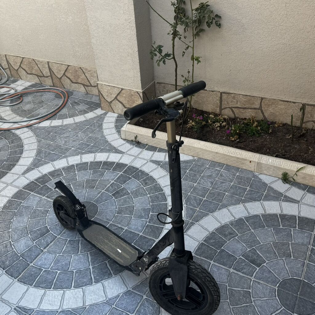 Elektrik skuter – şəhər içi rahat və səssiz hərəkət üçün — Skuterlər, rol konki, Saray