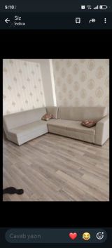 L formalı yumşaq künc divanı. Açıq bej rəngdədir və neytral interyerlə — Xanım — Furniture