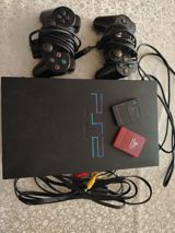 PlayStation 2 konsolu kontrollerləri ilə — Oyun konsolları