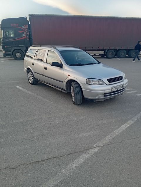 Opel Astra Caravan (universal) – gümüş rəng • Kuzov: universal (5