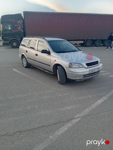 Opel Astra Caravan (universal) – gümüş rəng • Kuzov: universal (5