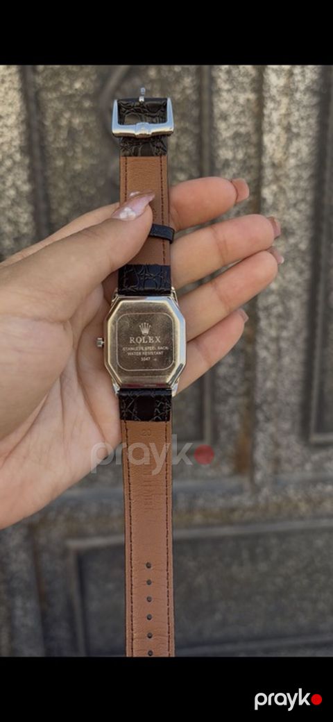 Klassik üslubda qol saatı - Marka: Rolex (korpus arxasında “Stainless