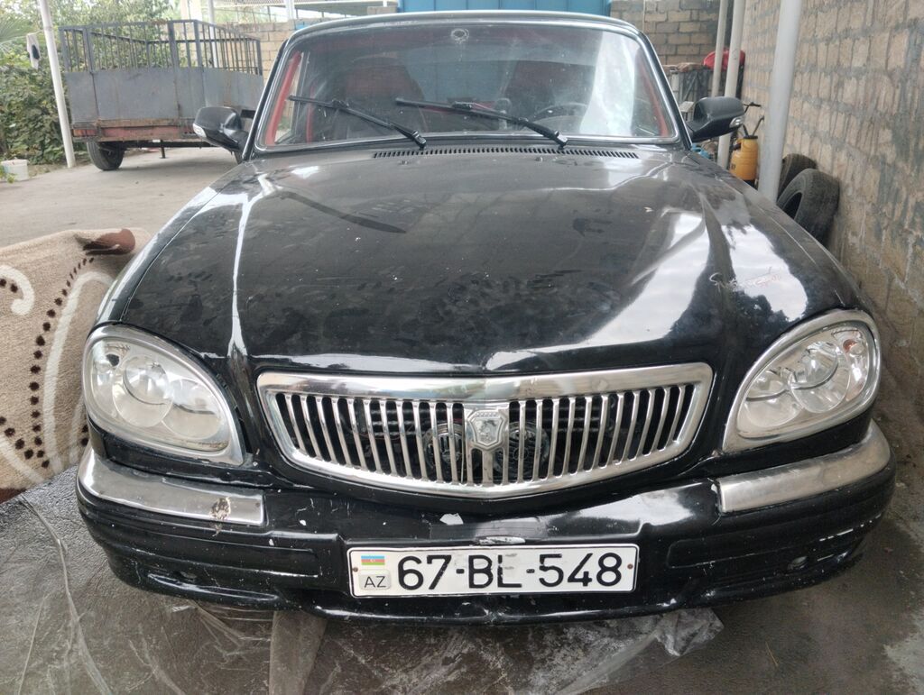 GAZ Volga 3110, qara rəng, sedan kuzov. Xüsusiyyətlər: - Klassik xrom — Avtomobillər, Ağdaş