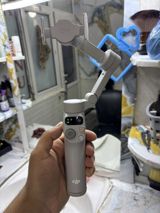 DJI OM seriyasından smartfon stabilizatoru (gimbal) — 3 oxlu mexaniki — Ştativlər, stabilizatorlar, video işıq